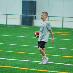 Boy holding the football