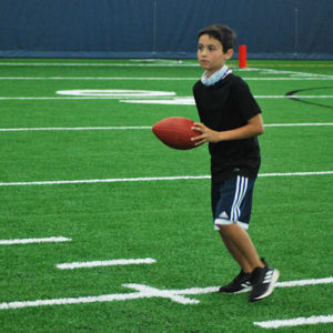 Boy about to kick the football
